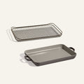 An Oven Rack sits above a matching Griddle Pan with handles, both featuring a rectangular design and displayed on a plain light background.